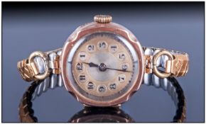 Ladies 1920`s 9ct Gold Cased Wristwatch. fitted to a gold plated expanding bracelet. Hallmarked 9.