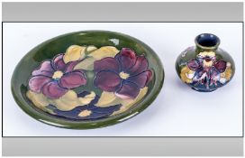 W. Moorcroft Shallow Footed Dish ` Clematis ` Pattern on Green Ground. Diameter 8.5 Inches.
