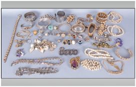 Collection Of Costume Jewellery Comprising bangles, rings, necklaces etc.