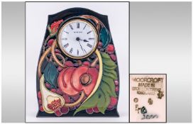 Moorcroft Modern Impressive Table Clock `Queens Choice` pattern. Designer Emma Bossons. Date 2000.