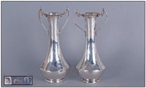 Silver Art Nouveau Pair Of Vases, of Tapering Shape with Small Shaped Handles. Makers Mark WB.LD;
