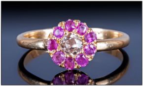 Antique 18ct Gold Set Rubies & Diamond Cluster Ring. The central old cut Diamond surrounded by 8