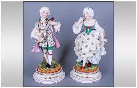 Pair Of Late 19th Century French Bisque Figures, Gentleman & Lady in traditional dress.