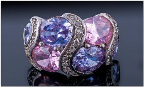 Designer Pink and Lilac Faux Diamond Cocktail Ring, the domed sterling silver mount set with