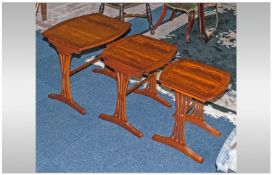 Mahogany Sheraton Style Inlaid Nest Of Three Tables, with slatted open sides , on reeded legs.