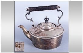 Electro Plated Silver Teapot with lid and wooden handles.