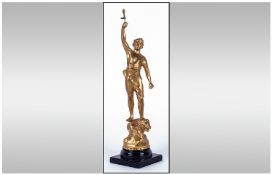 Early 20th Century Gold Painted Spelter Figure of a Man Dressed In Robes, Standing on the back of a