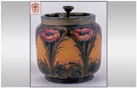 James Macintyre Lidded Florianware Tobacco Jar `Poppy` Design. Circa 1902-05, 5`` in height,
