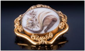 Gilt/ Pinchbeck Double Sided Mourning Brooch, the oval front panel having a delicate floral design