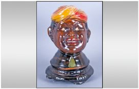 1930`s Money Bank in the Form of a Black Boy. Marked to base `English Porcelain`. 8 inches in