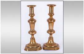 An English Pair of 18/19th Century Brass Candlesticks. Each Candlestick 11 Inches High.