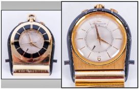 Jaeger -LeCoultre 20thC Travel Alarm Clock, silvered dial with gilt baton hour makers and arabic