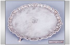 A Small Silver Salver From The 1930`s with Pie crust Border, Raised on 3 Spade Feet. Hallmark