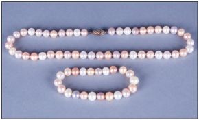 Cultured Fresh Water Pink, White and Lilac Pearl Necklace and Bracelet, the necklace knotted and