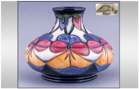 Moorcroft Tube Lined Onion Shaped Modern Vase, Date 2011, 4.25`` in height.