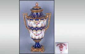 Royal Crown Derby Two Handle Urn Shaped Lidded Vase, in the Regency style. Date 1903. Stands 9.5``