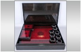 Modern Chinese Lacquered And Boxed Dining Room Set, comprising 8 place mates, coffee mats & napkin