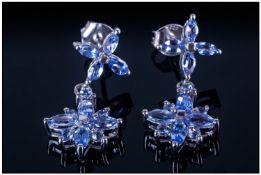 Tanzanite Flower or Star Drop Earrings, each cluster drop comprises four marquise cut tanzanites,