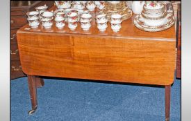 A Large Mahogany Late Georgian Pembroke Table with one dummy drawer to one side. Opening drawer on