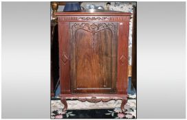 A Carved 1920`s Mahogany Corner Cupboard Unit, on small cabriole legs with a carved skirt. With