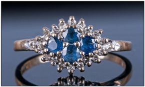 Ladies 9ct Gold Set Diamond & Sapphire Cluster Ring, Fully Hallmarked. The four central Sapphires
