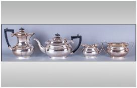 Silver Plated Four Piece Tea Service, comprising tea pot, coffee pot, two handled sugar bowl & milk