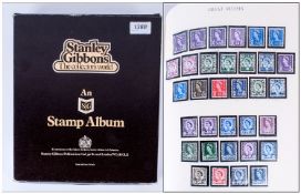 A Stanley Gibbons Windsor Loose Leaf GB Stamp Album, contains two one penny black stamps, a few