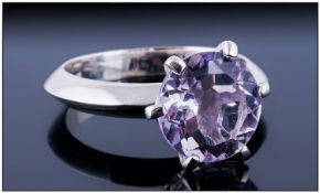 Rose De France Amethyst Solitaire, round cut and set in a Tiffany style, raised, six prong mount,