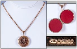 9ct Gold Locket & Chain, 31mm circular locket. Hinged front with engraved floral decoration. Fully