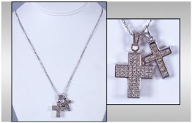 18ct White Gold Diamond Set Cross fitted on a 14ct white gold chain. Estimated diamond weight 1.