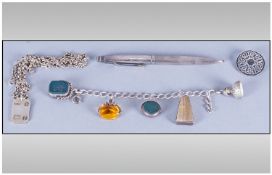 A Small Collection Of Vintage Silver Jewellery Items, 5 in total. 1. Charm bracelets, 2. silver