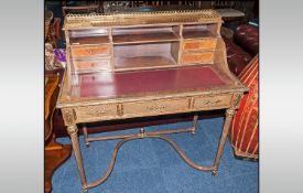 French Style Ladies Writing Desk in walnut, cross banded with satin wood with a red tooled leather