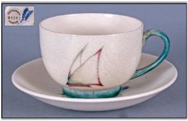 WITHDRAWN  Moorcroft Cup And Saucer, Yacht pattern, circa 1930`s. Grazing to cup and saucer. Saucer