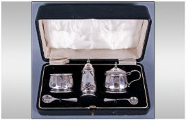 A Silver Matched 3 Piece Cruet Set of ribbed design. Complete with blue liners & spoons. Hallmark