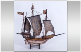 Wooden Model of a Sailing Ship, with stand.