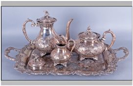 Silver Plated Four Piece Teaset with embossed floral decoration and bird finials. Together with a