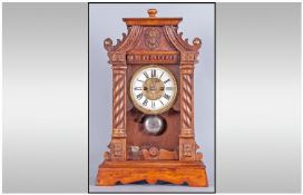 HAC Wurttemberg Late 19th Century Carved Wood Cased Postman's Alarm Clock, Porcelain dial, strikes