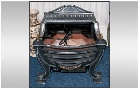 Contemporary Electric Alloy Dog Grate Fire in the regency style.