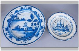 Two Delft Ware Plates, comprising one decorated with a Chinese pagoda on a river bank, A/F, 18th