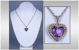 An Edwardian Gold Coloured Heart Shaped Pendant. Set with a Heart Shaped Amethyst of Good Colour,