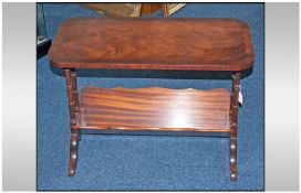 A Reproduction Georgian Style Book Trough Table, on Queen Ann type leg on spindle legs. 20 inches in