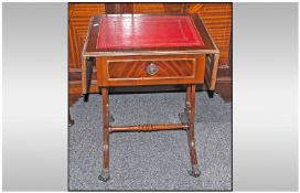 A Small Mahogany Reproduction Regency Style Sofa Table, with flat sides and tooled red leather tops,