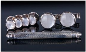 A Boxed Set Of Four Piece Silver And Mother Of Pearl Dress Shirt Buttons, with matching cufflinks