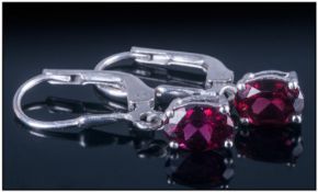 Rhodolite Garnet Lever Back Earrings, oval faceted garnets of the rich, berry colouring with flashes