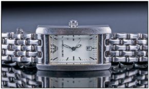Ladies Designer Emporio Armani Wristwatch. Stainless steel. Rectangular case with date aperture,