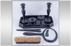 Ebony Dressing Table Set including mirror, candlesticks, brush etc on tray.