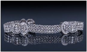 18ct White Gold Diamond Bracelet, in the 40's style. Consisting of three rows of round modern
