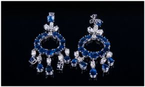 Pair Of Ladies 18ct White Gold Diamond And Sapphire Earrings, consisting of three marquise shaped