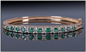 Ladies 9ct Gold Emerald And Diamond Hinged Bangle. Fully hallmarked 1970s. Good quality. 12.1 grams.