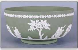 Wedgwood Green Bowl, classical garden scenes to outer surface. 8 inches in diameter. Original box.